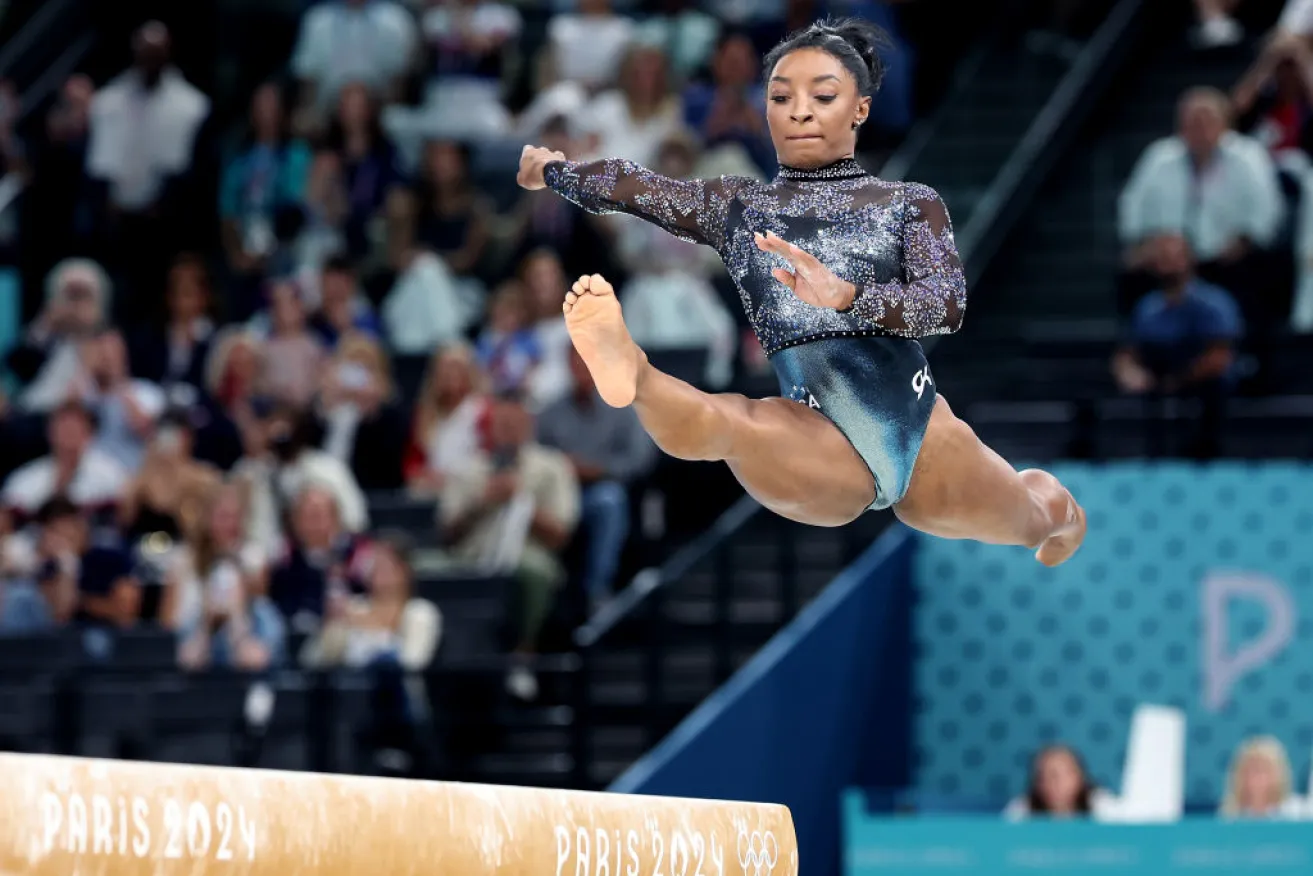 Biles Dazzles in Olympic Gymnastics Return